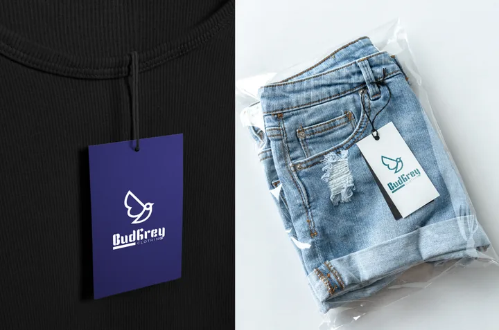 BudGrey hang tags on a black tee and denim shorts