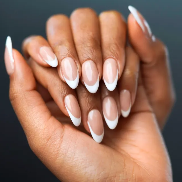 Close-up of French-tip nails, beauty photography for VOG Beauty Salon